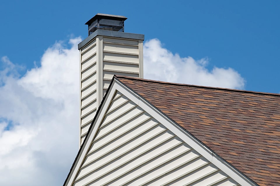 Adobe Stock image of a chimney chase with a top damper.