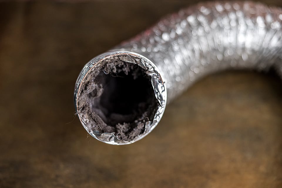 Adobe Stock image of a clogged dryer vent.