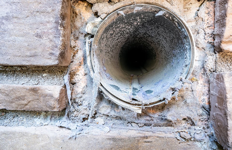 Adobe Stock image of a dirty dryer vent.