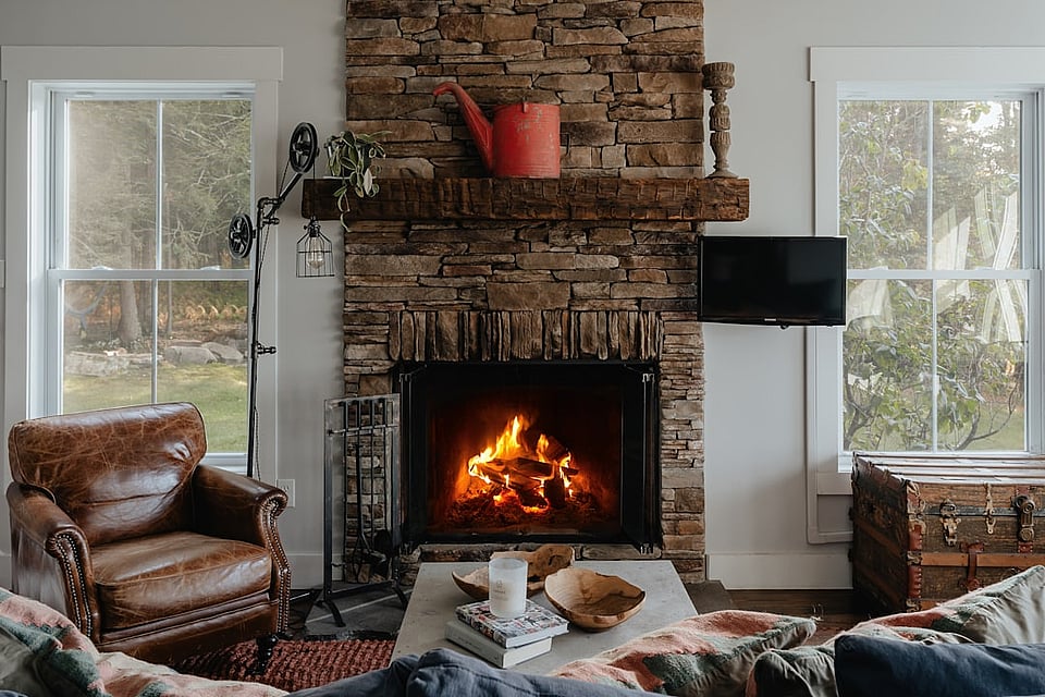 Stock image of a brick fireplace.