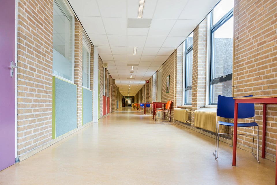Adobe Stock image of a school hallway.
