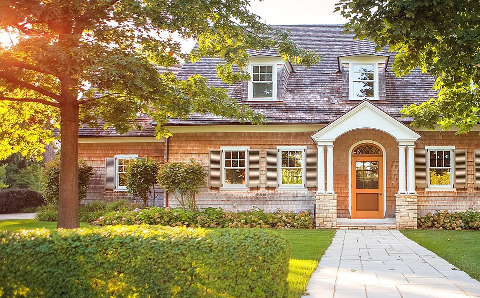 Adobe Stock image of a home with a long walkway.