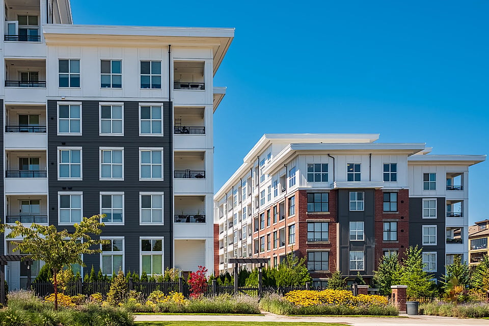 Adobe Stock image of apartment complexes.