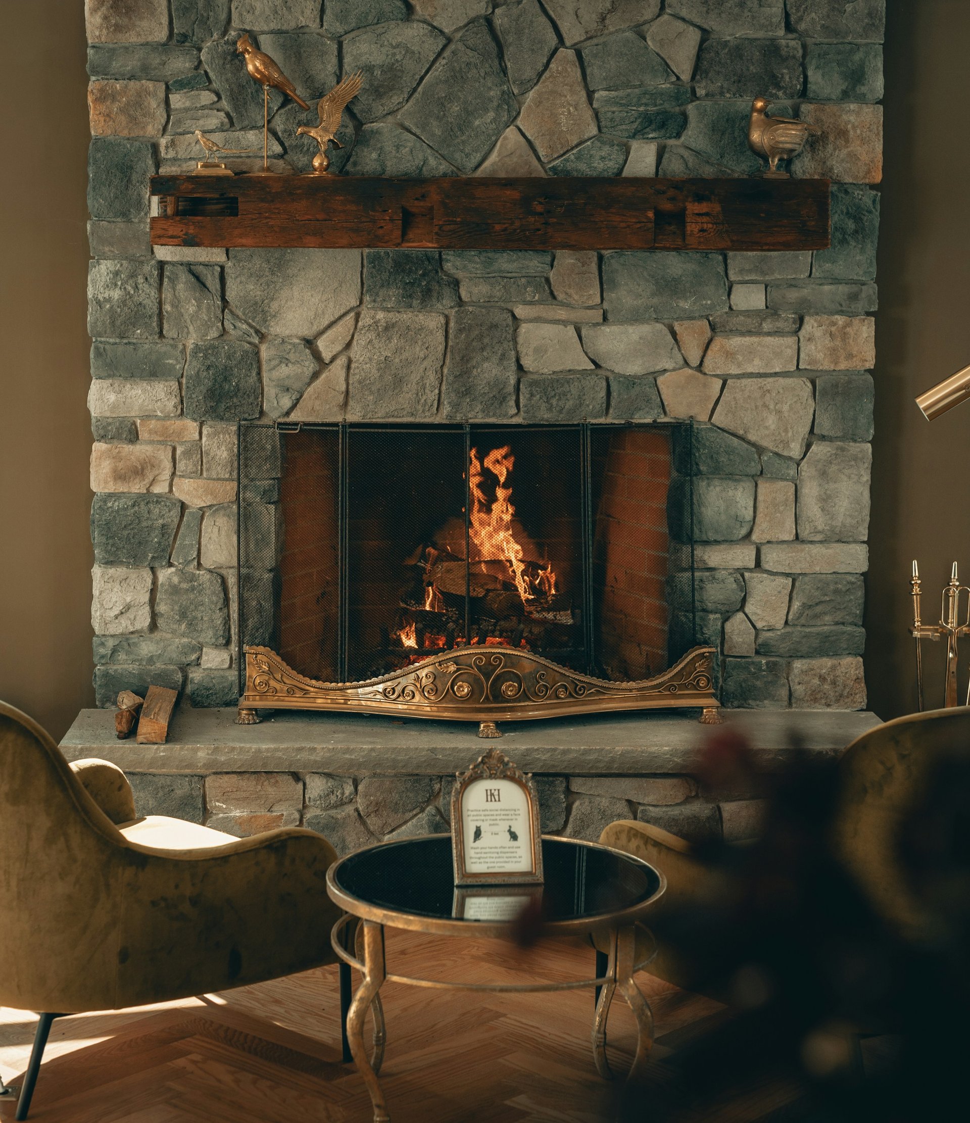 Chimney sweep technician servicing a Southern California home fireplace
