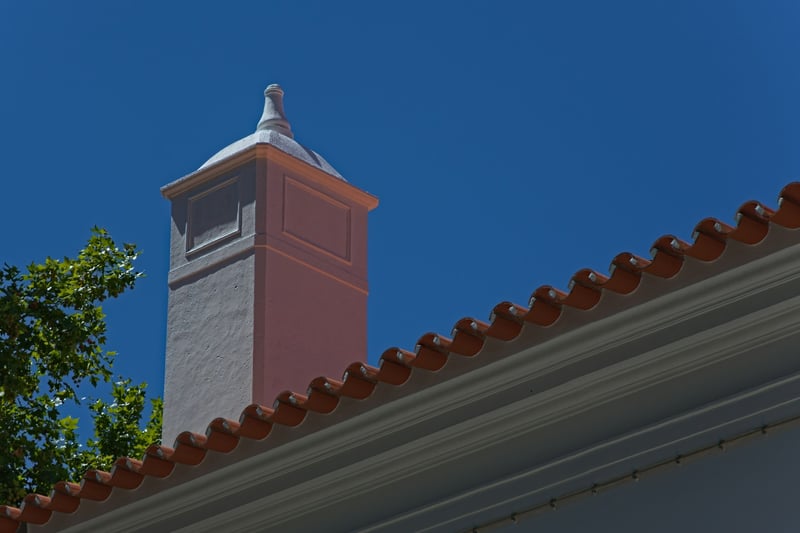 Professional chimney service technician at work — Chim Chiminey Sweep LLC