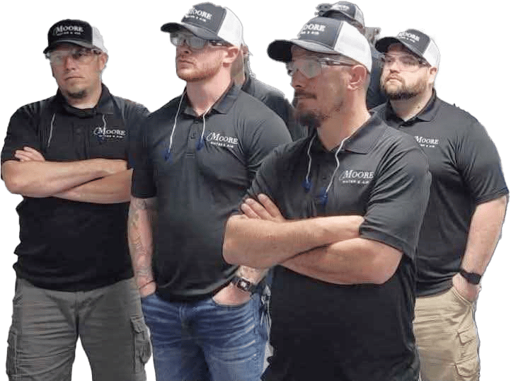 Moore Water treatment team members ready to serve your home