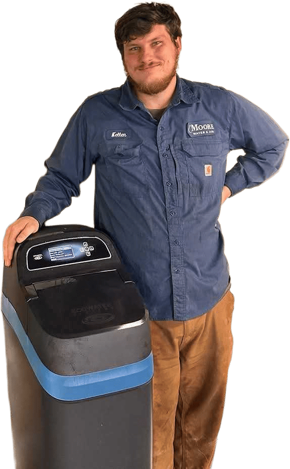 Moore Water technician with water softener system