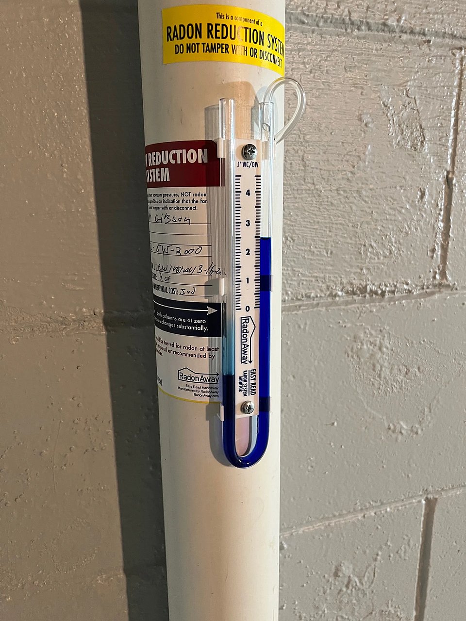 A manometer that reads radon levels in a home.