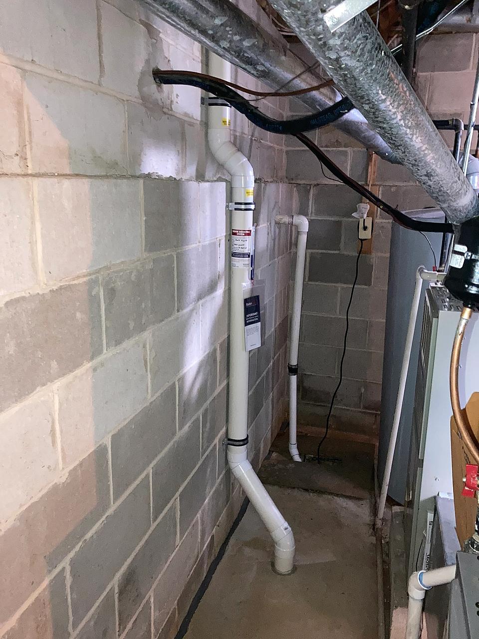 A radon mitigation system installed by Radon Removal in New Jersey.