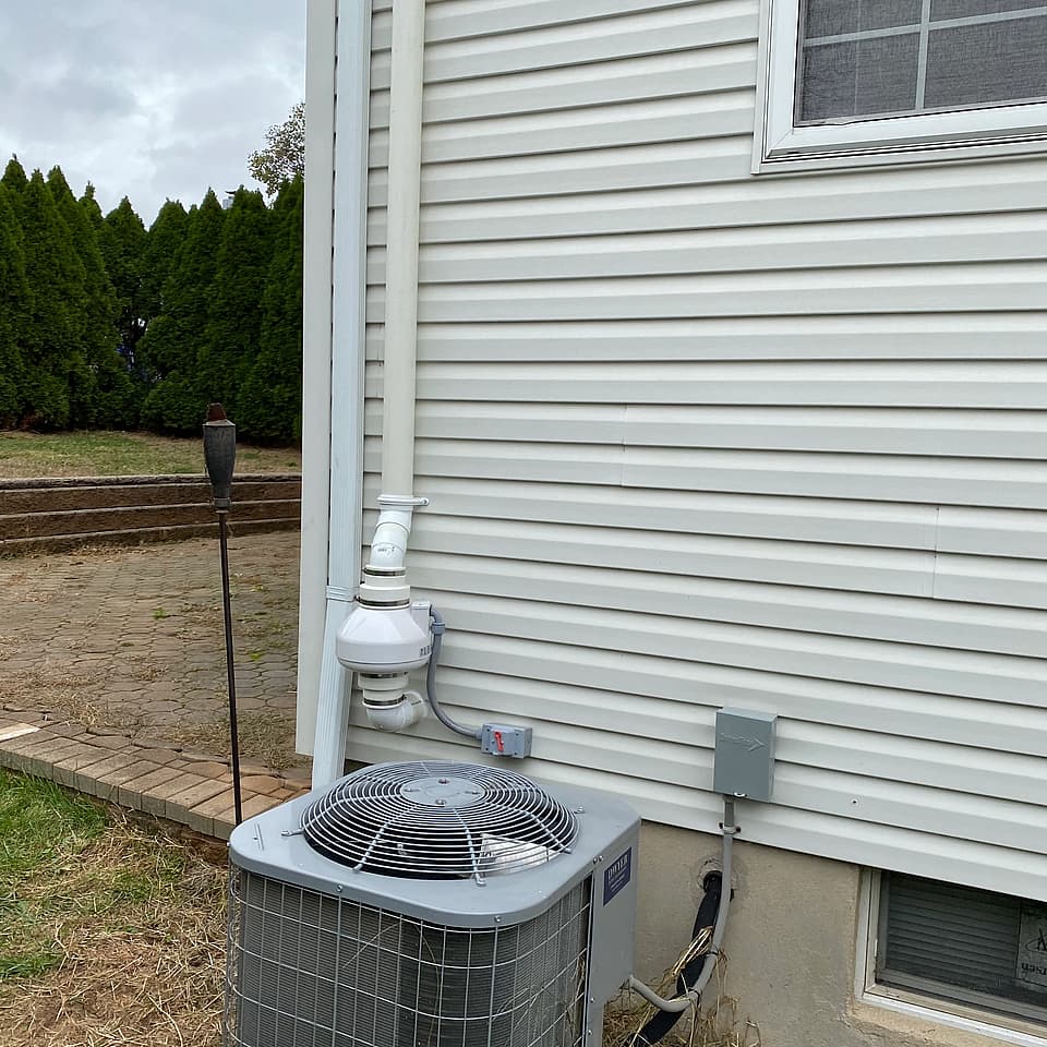 A radon mitigation system installed by Radon Removal in New Jersey.