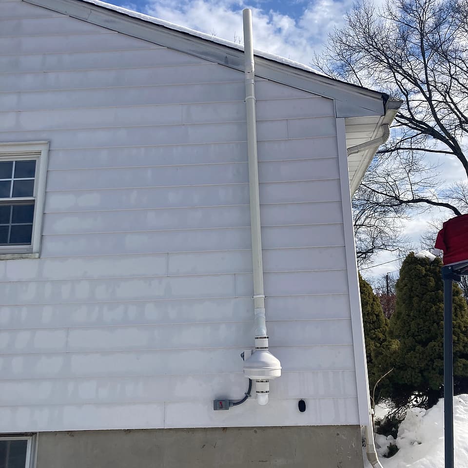 A radon mitigation system installed by Radon Removal in New Jersey.