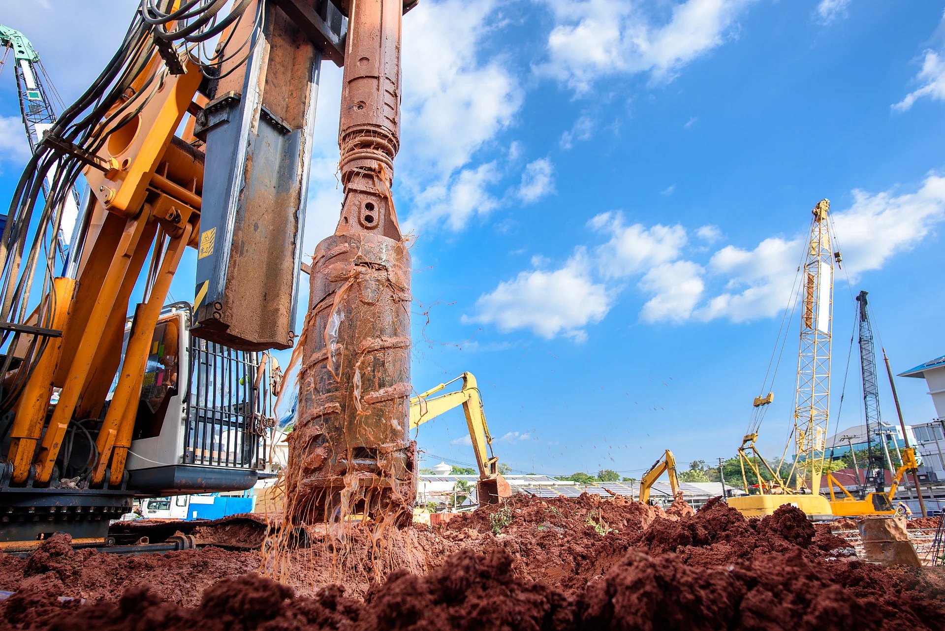 Adobe Stock image of a machine drilling a hole for a well.