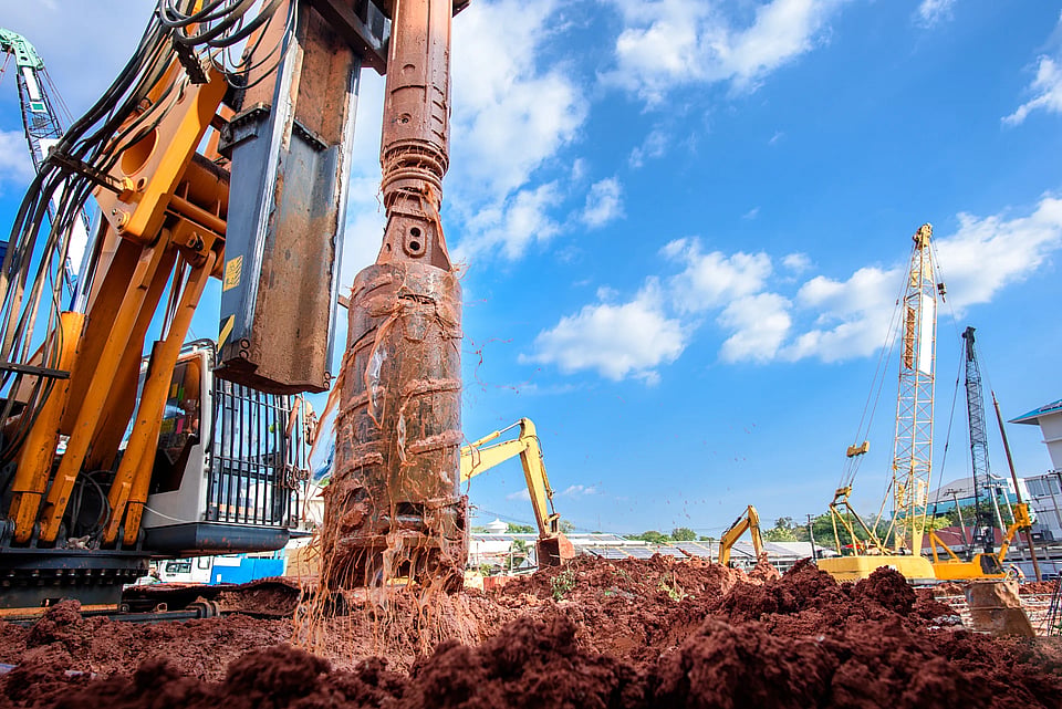 Adobe Stock image of a machine drilling a hole for a well.
