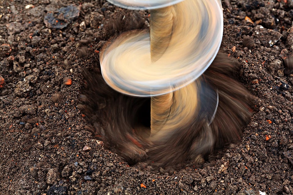 Adobe Stock image of a well drill in motion.