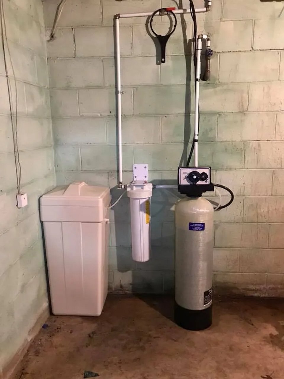 Original image of water treatment and softener system installed by Rowan Well Drilling.