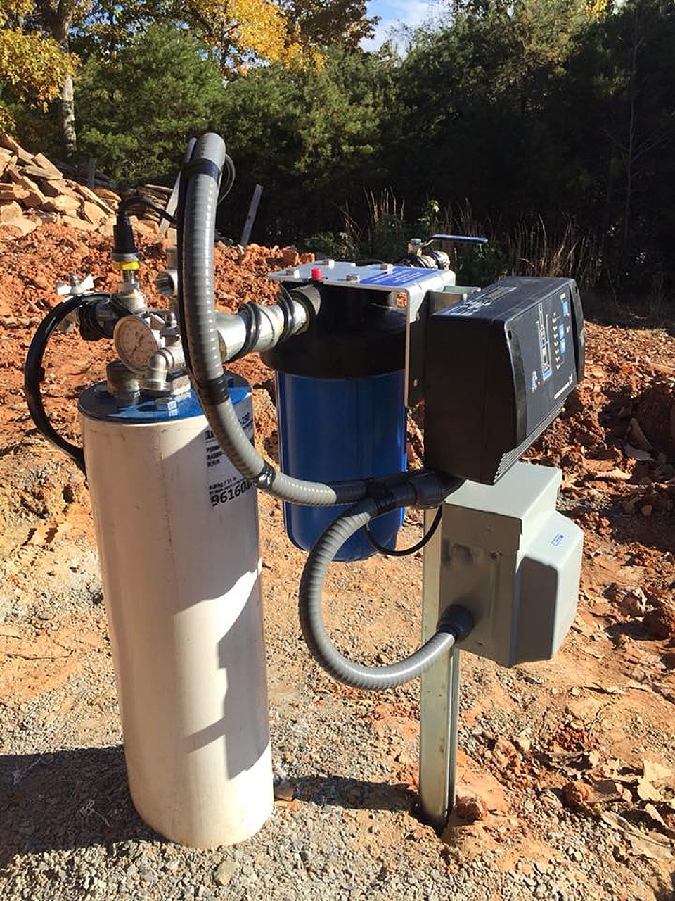 Original photo of a well water pump and irrigation system installed by Rowan Well Drilling.