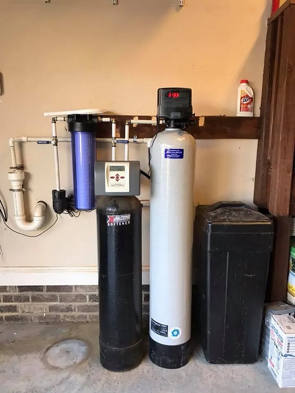 Water treatment and softener system installed by Rowan Well Drilling.