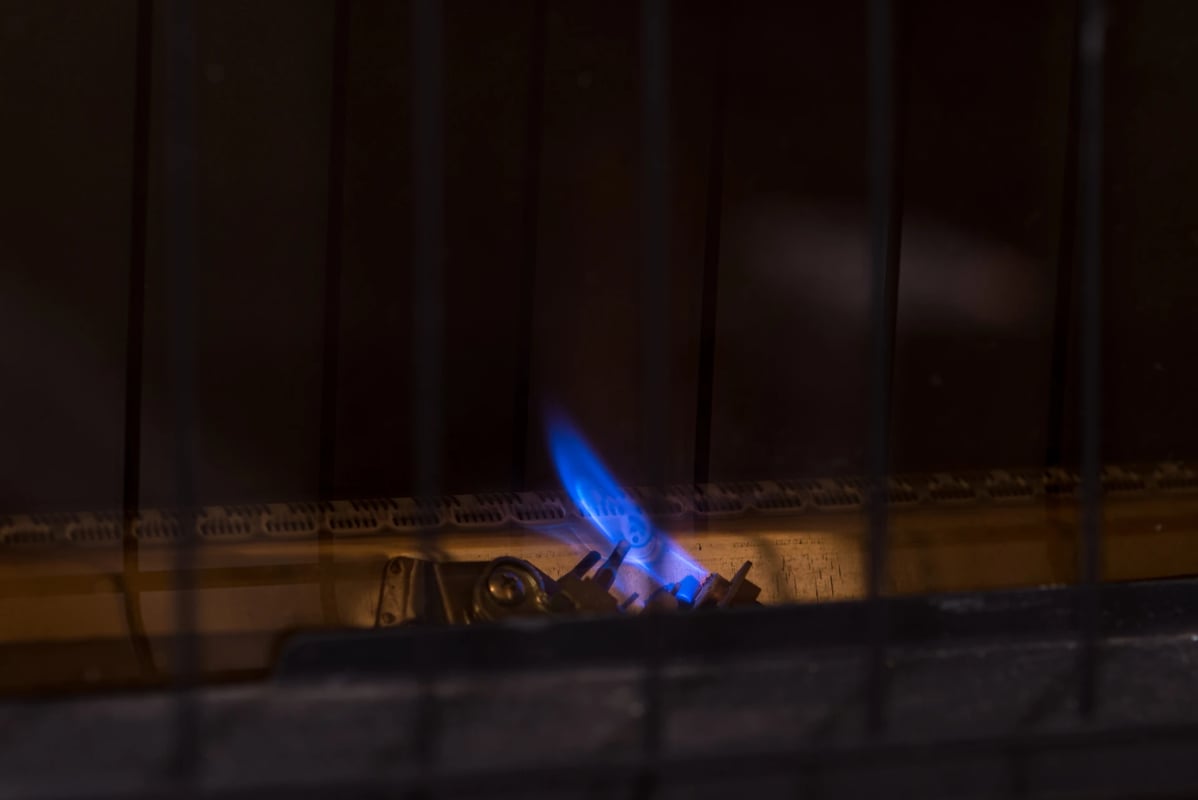 Adobe Stock image of a blue pilot light.