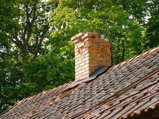 Crumbling masonry chimney