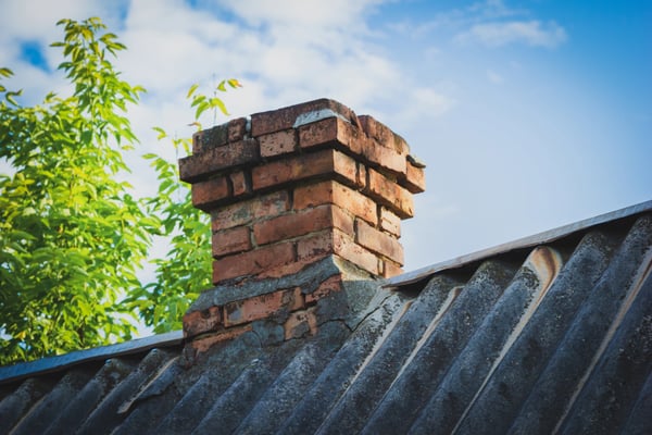 Masonry chimney that's experiencing decay and needs repair work