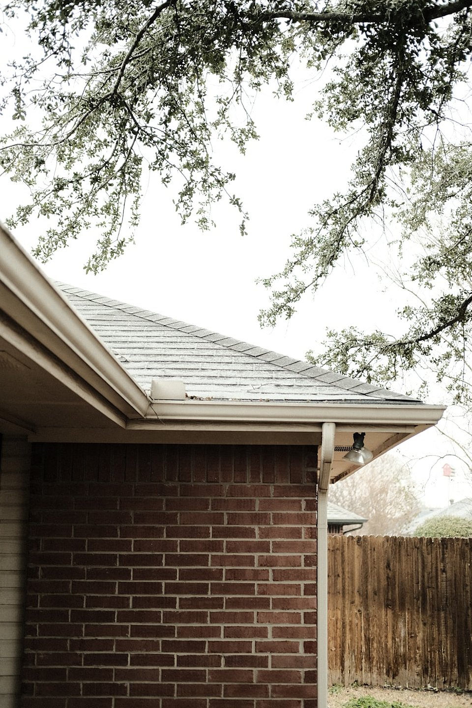 Brick house roof and gutter area
