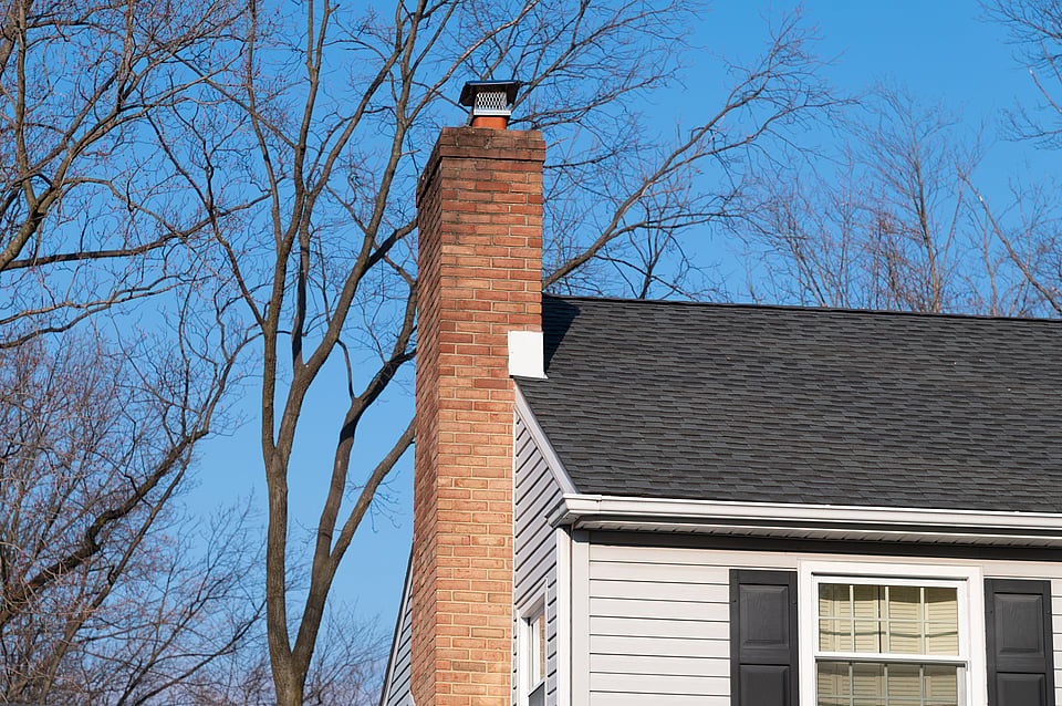 Expert chimney masonry repair on a residential home in New York
