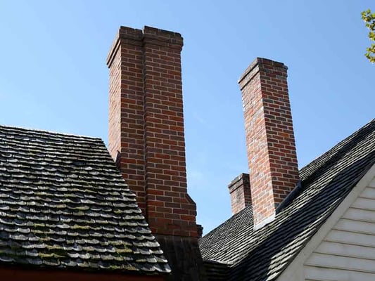 Two masonry chimneys