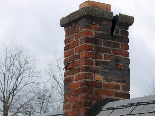 Broken down masonry chimney